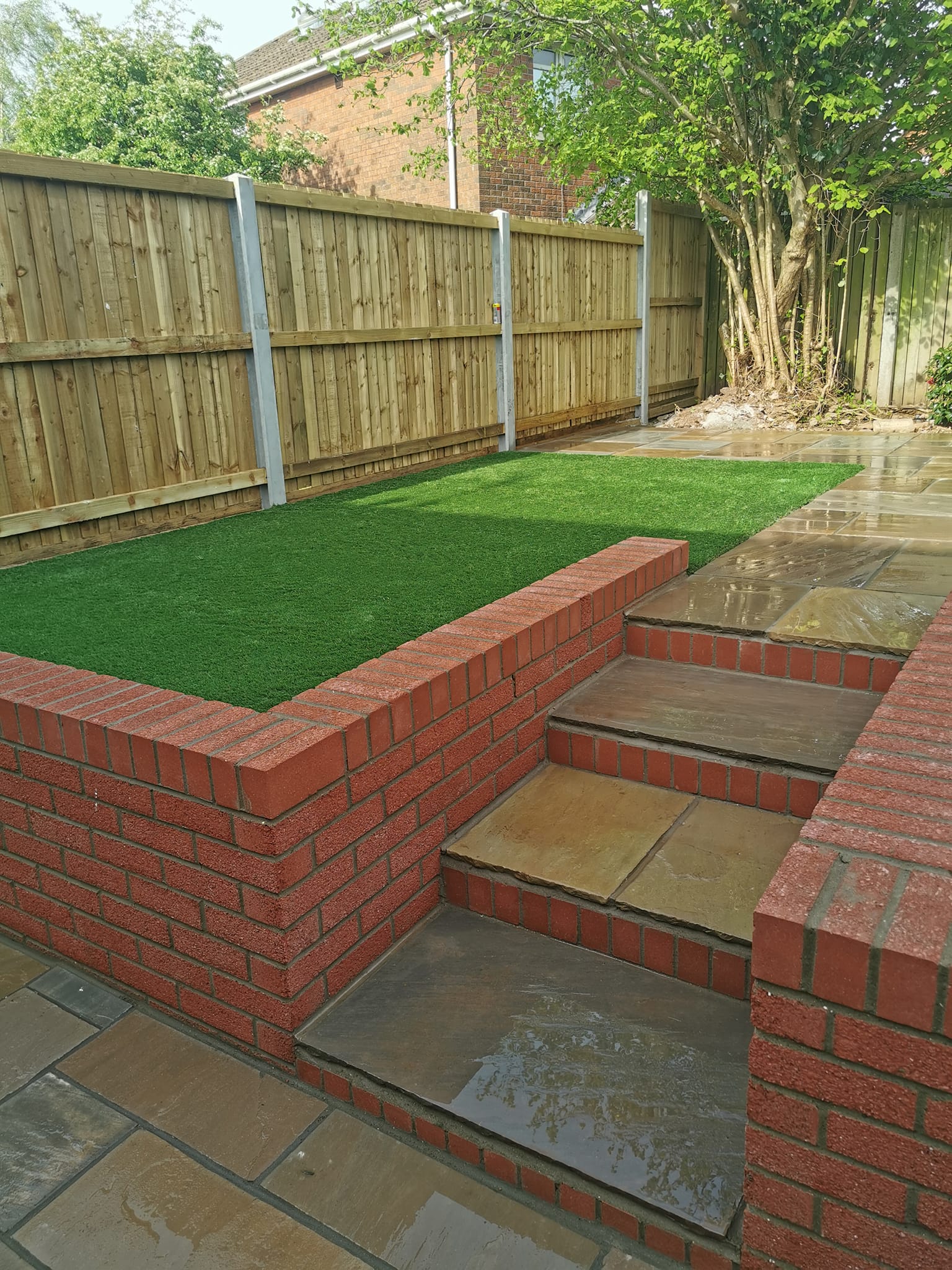 Recent landscaping project showing finished garden hard landscaping by JM Fencing and Gardening Services